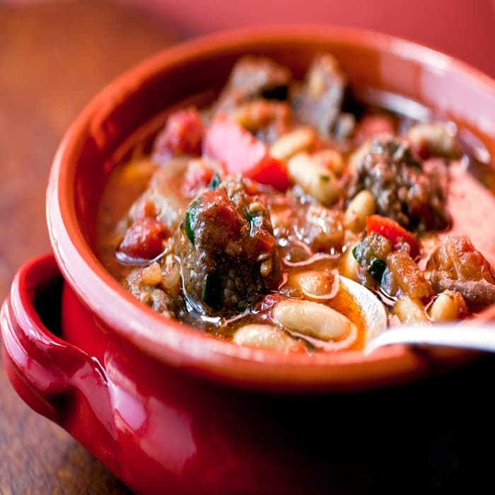 Spanish-style slow-cooked lamb shoulder & beans